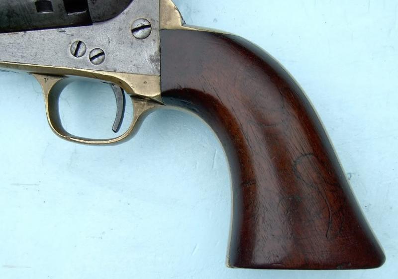 Colt Mod. 1851 Navy,engraved,silver plating,cased,postwar,cal..36,no.  16337. Matching numbers. Octagonal barrel,bright bore,length 7-1/2. Six  shots. Manufactured in 1975. Firm address on barrel,on frame marked Colts  Patent. On cylinder roll