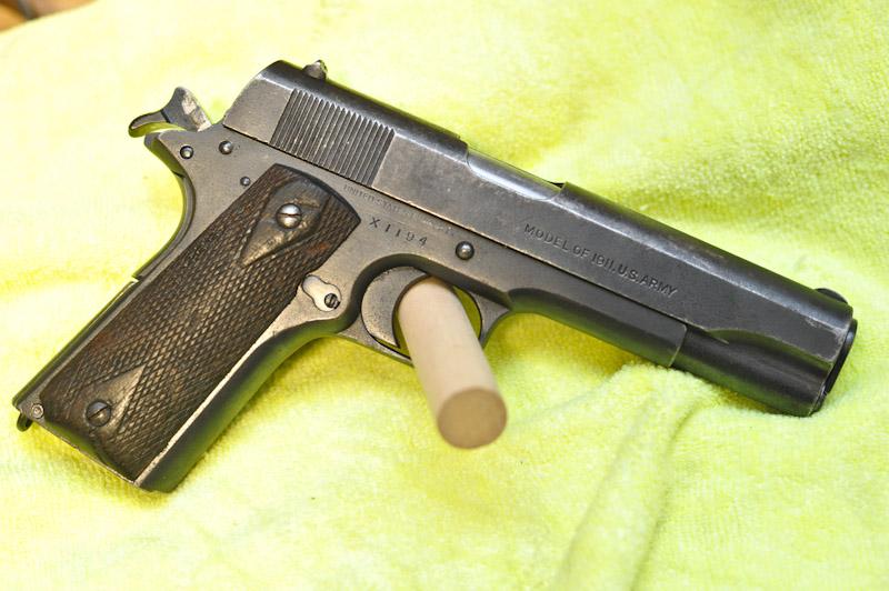 Serial Number 74215, blued frame with wood grips, COLTS CAL.