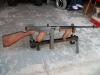 M1928 Thompson .45 caliber semi-auto clip fed rifle. This was also issued to some WWII soldiers. It has a 30 round stick magazine (some 20 rounders were Common issue) and a 10 round drum magazine (original issue was 50 round). It has a finned vertical Han